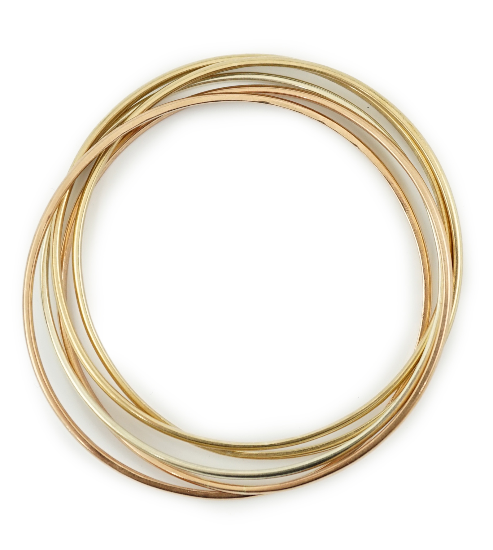 A set of five modern three colour 9ct gold inter-looping bangles